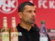 Sparker treneren som har ledet klubben til semifinale i den tyske cupen