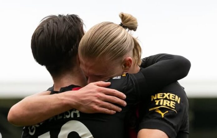 Jack Grealish og Erling Braut Haaland